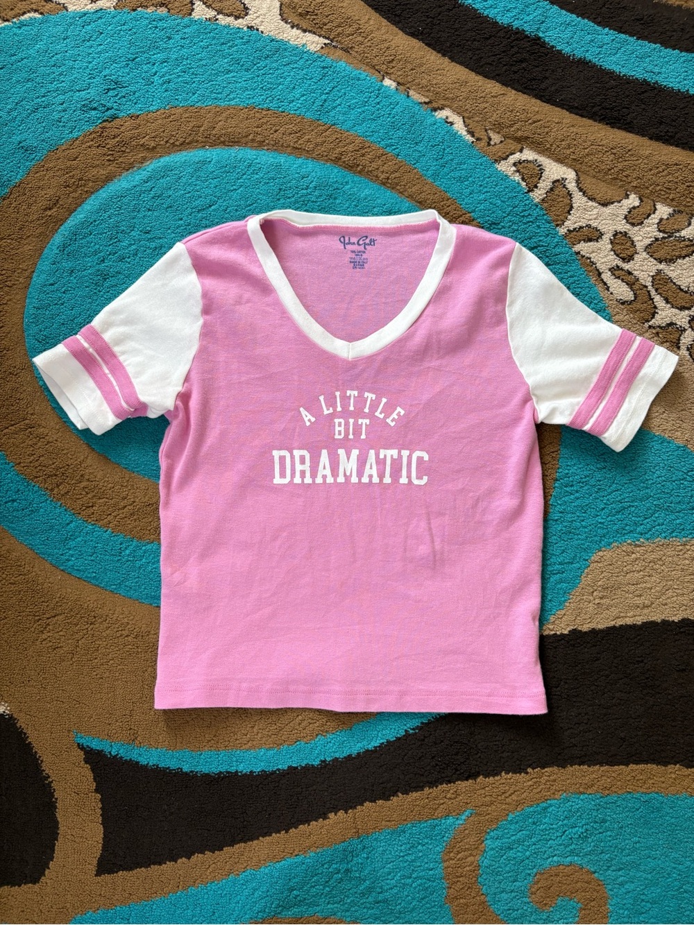 Brandy Melville John Galt Pink V-Neck Graphic Tee with White Sleeves